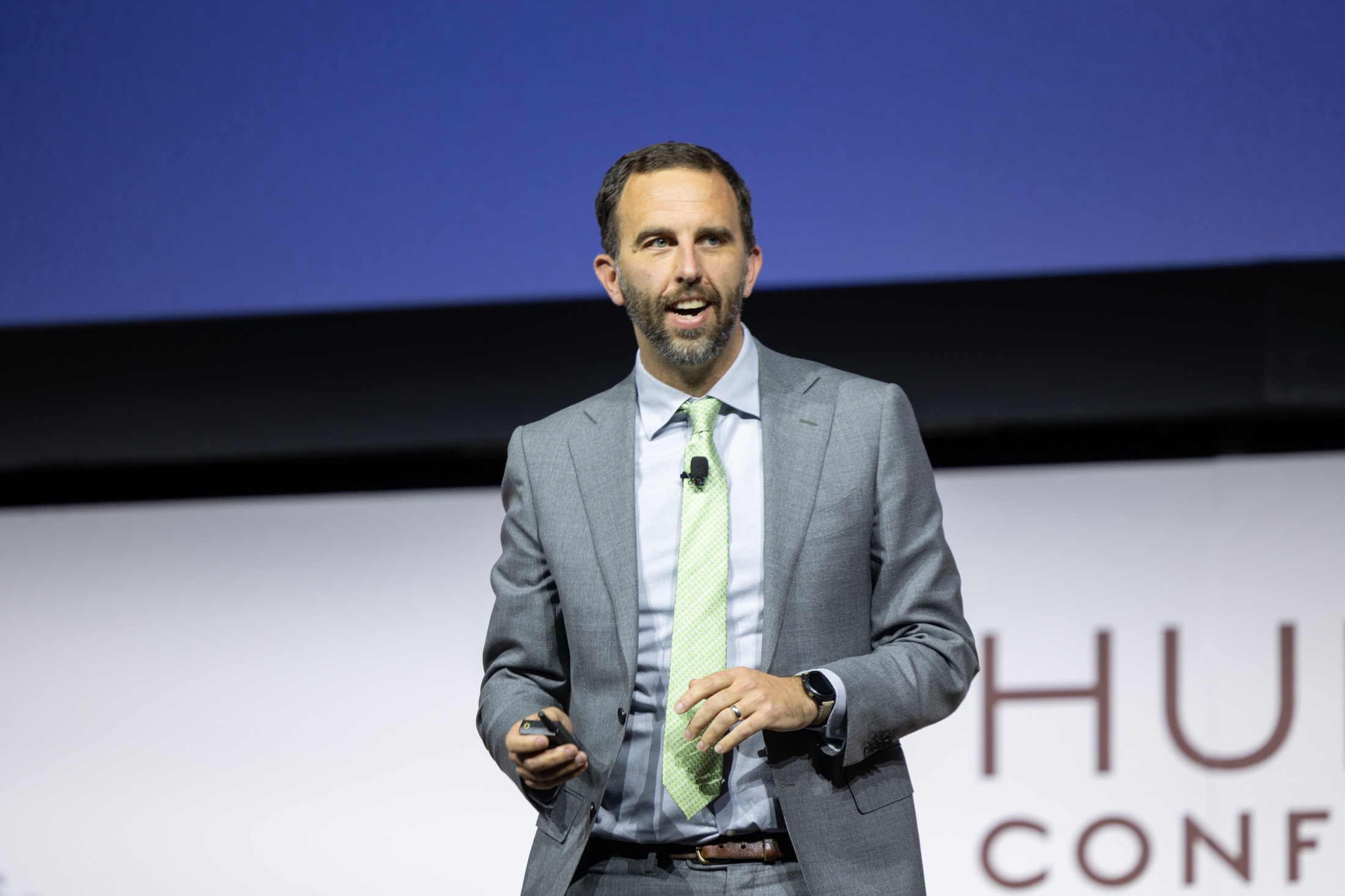 Jamie Lane speaking on stage at the Hunter Hotel Conference
